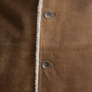 
细节特写 of Notch & Button Hardware on Kolby Distressed Brown Shearling Long Coat