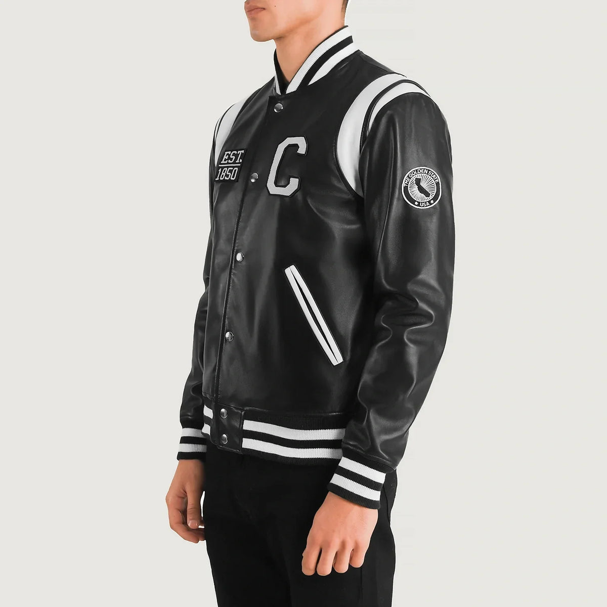 
Black & White Sheepskin Leather Varsity Jacket - 展现肩线贴合与利落下摆的背部视角