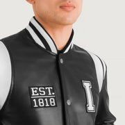 Close-Up Detail of Varsity &amp; Snap Button Hardware on Liberte Illinois 黑色 Leather Varsity 真皮夹克 男士