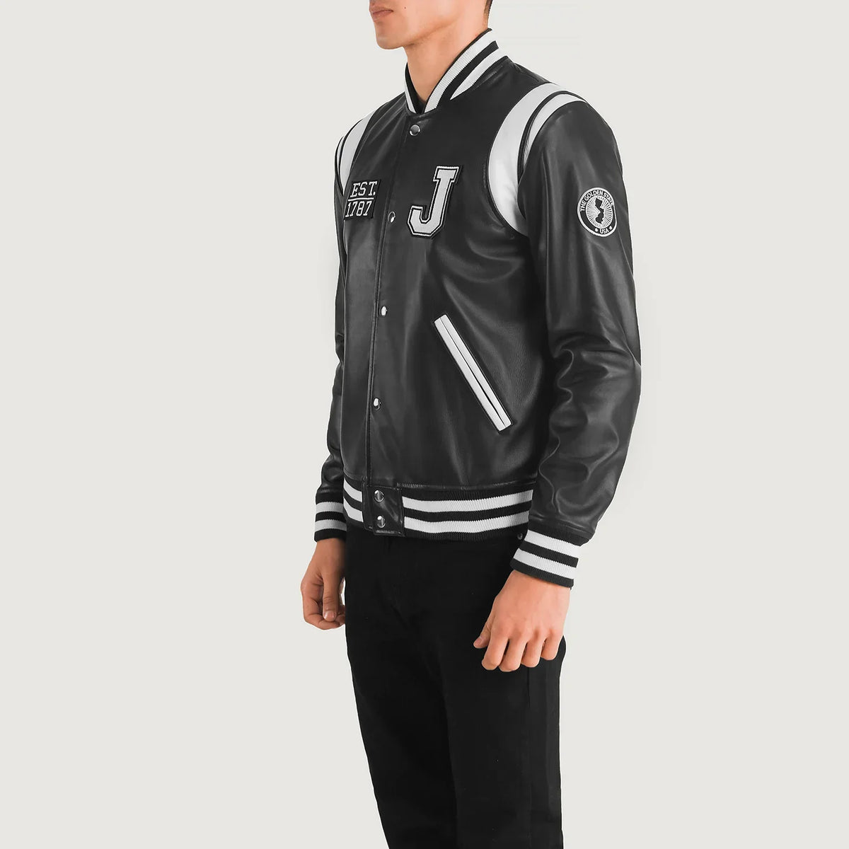 
Black & White Sheepskin Leather Varsity Jacket - 展现肩线贴合与利落下摆的背部视角