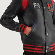 
细节特写 of Varsity & Snap Button Hardware on Liberte USA Black Leather Varsity Jacket