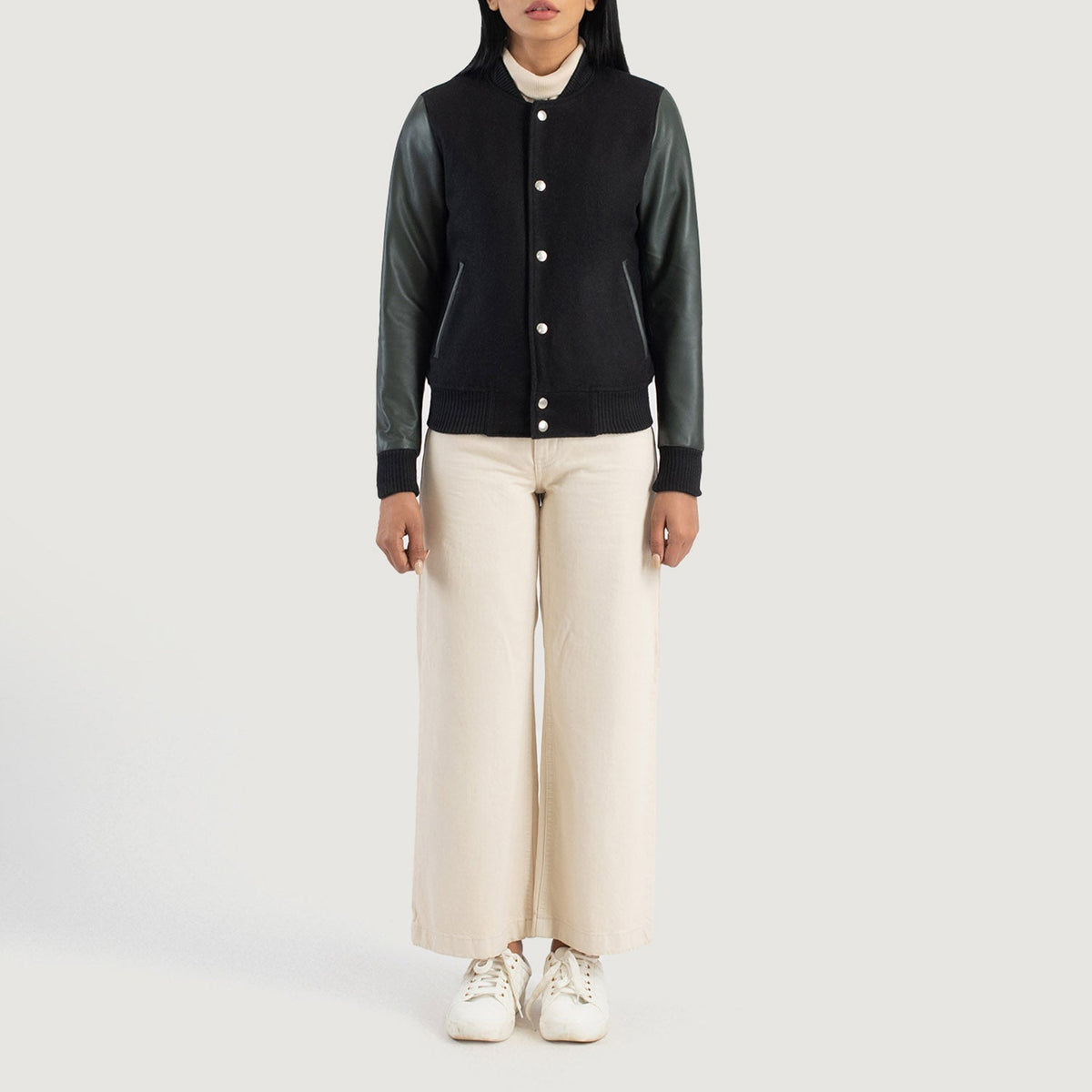 
Savant Green Hybrid Varsity Jacket - 展现立体袖型与合身版型的侧身视角