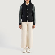 
Savant Green Hybrid Varsity Jacket - 展现立体袖型与合身版型的侧身视角