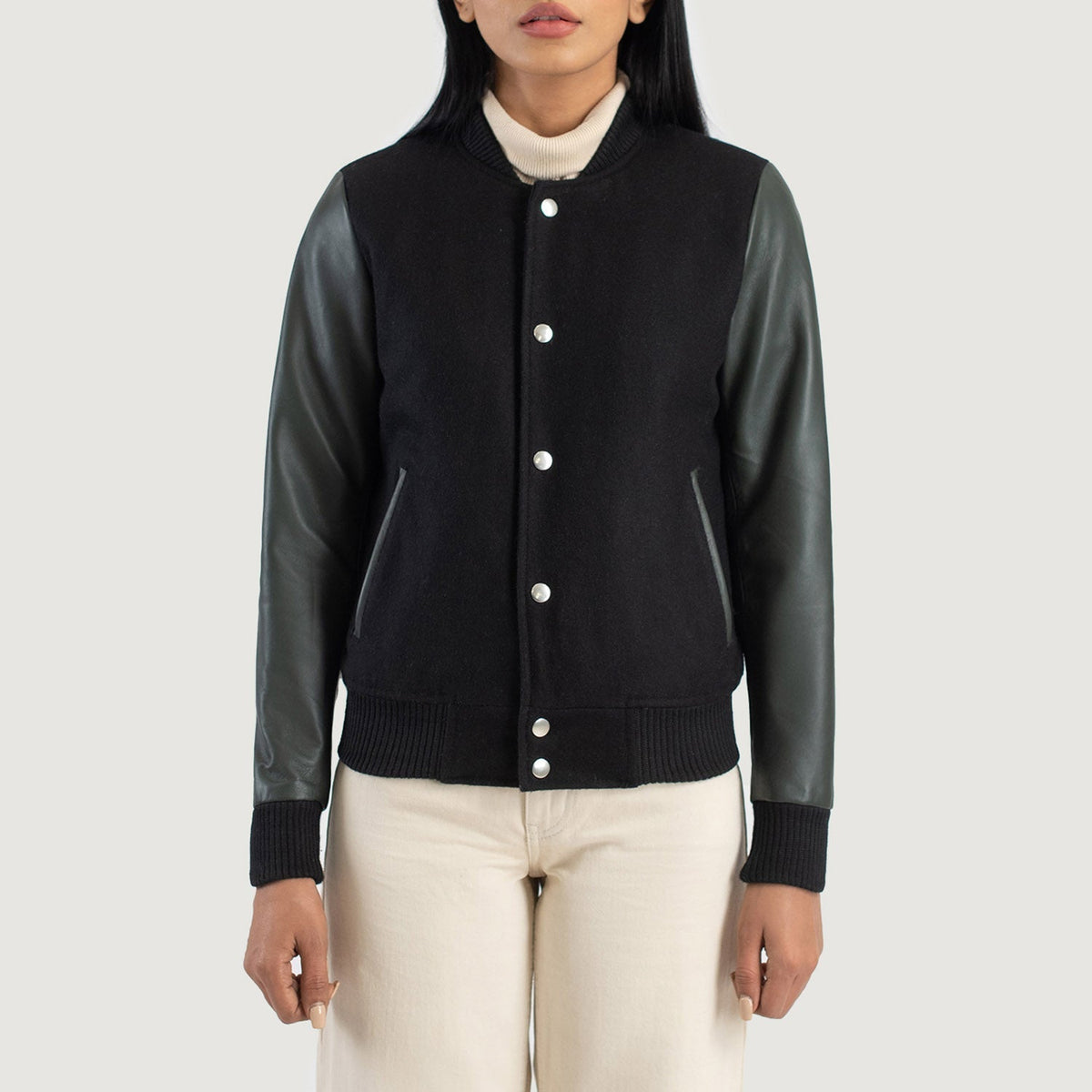 
细节特写 of Varsity & Snap Buttons Hardware on Savant Green Hybrid Varsity Jacket