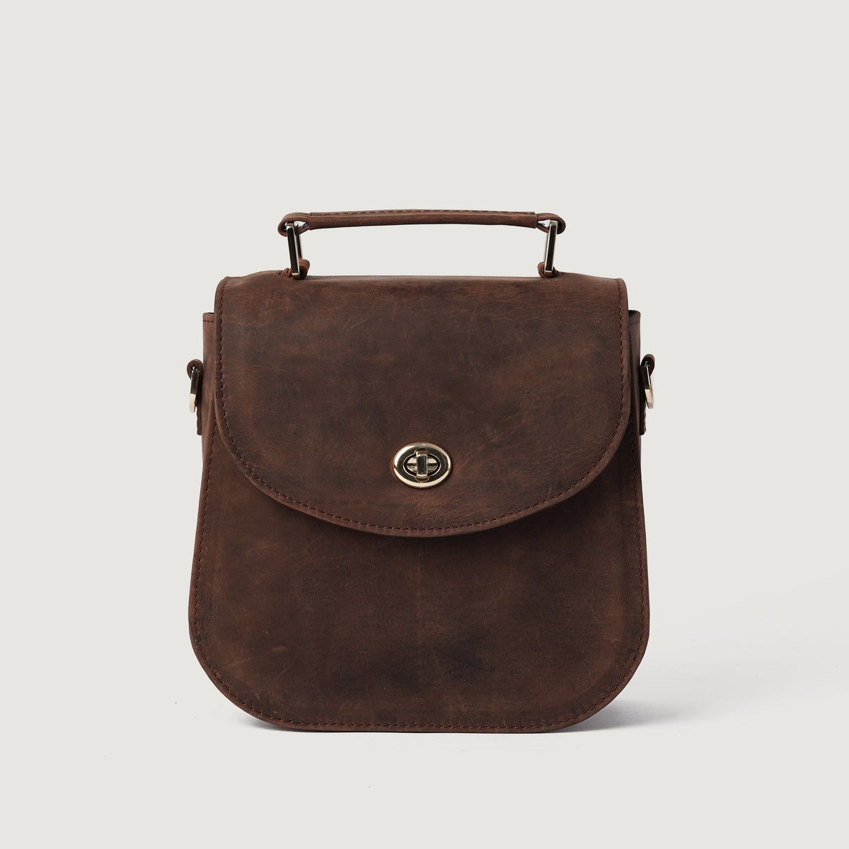 
The Sandra Vintage Distressed Brown Leather Saddle Bag For Women - 立体侧面展现包身风琴褶与扩容深度